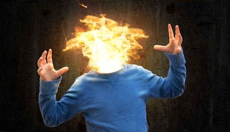 Čovek sa plamenom na glavi kao znak za burnout u preduzetništvu
